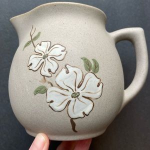 Vintage small ceramic pitcher with flowers. Pigeon Forge Tennessee.
